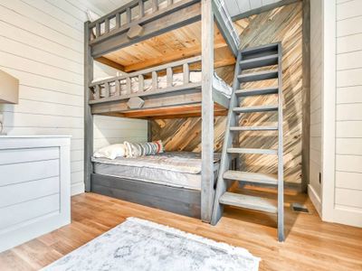 On the ground level is a 3-tier Bunk room with 3 double beds.