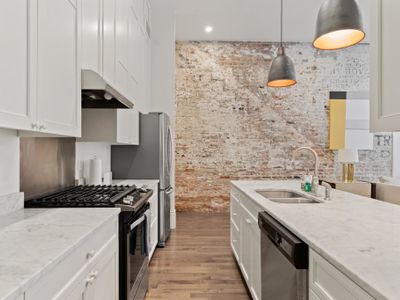 Kitchen space with historic brick walls