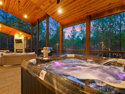 The luxury 8-person hot tub on the covered patio.