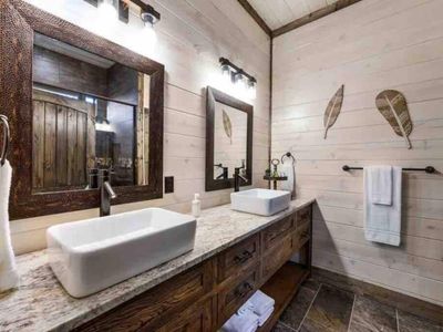 The private master bathroom has a double vanity and walk-in shower!