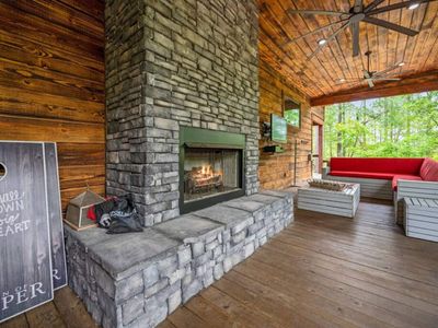 This floor to ceiling fireplace is the epitome of rustic luxury.