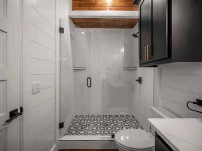 The private attached bathroom with a walk-in shower.