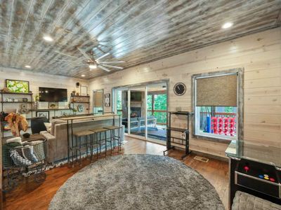Upstairs is the loft/game room with a private balcony.