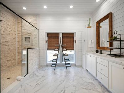 Private bathroom with a large walk-in shower.