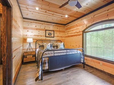 Upstairs King Bedroom 1. With a trundle/day bed and private bathroom.