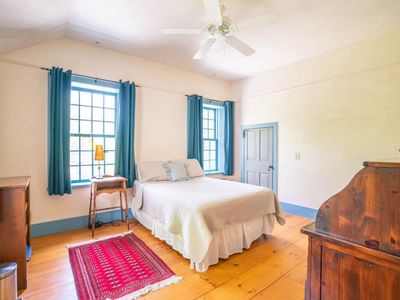2nd floor guest bedroom with queen sized bed.