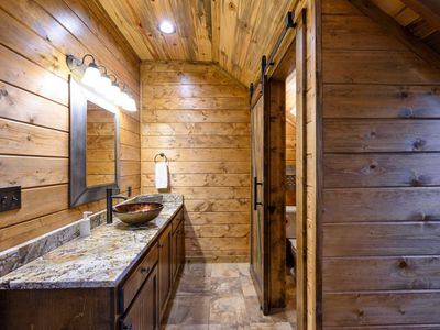 The private bathroom has a walk-in shower.