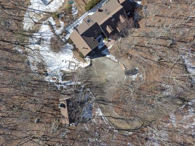 A bird's eye view of the compound at Garrison Woods, with the main house on the right and the guest house on the left.