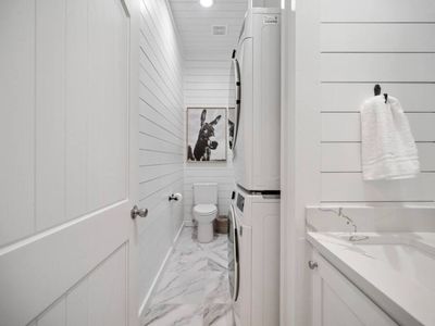 Laundry & half bath off the kitchen.
