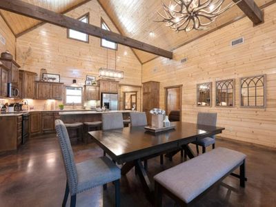The dining area seamlessly transitions into the kitchen