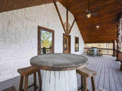 The covered patio features many tables so guests can choose their preferred spot