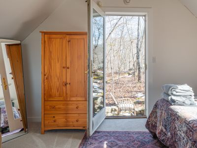 Step out onto the petite patio just outside the bedroom door.