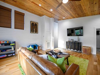 Leather couch, games, and a smart tv!