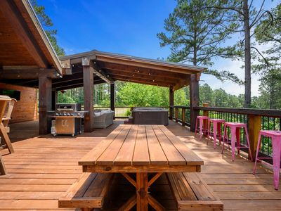 A picnic style table on the patio.