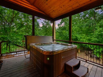 Luxury hot tub on the covered deck!