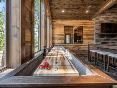 Shuffleboard is found in the living area.