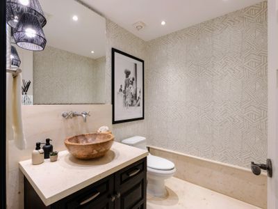 Chic Powder Bath Complements the Space, Adding to the 4 Full Baths