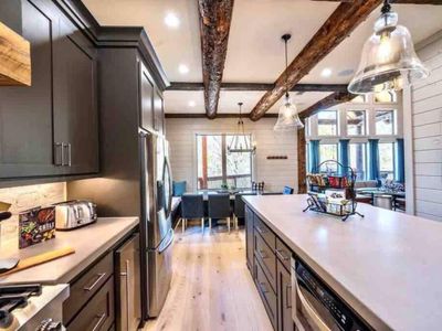 The kitchen seamlessly transitions into the formal dining area.