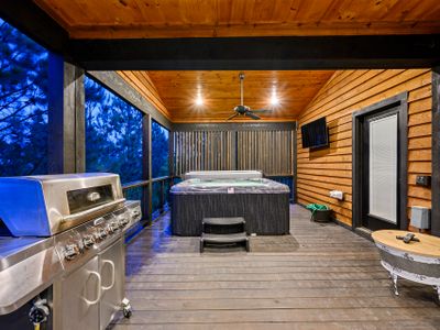 The luxury hot tub and gas grill, propane provided.