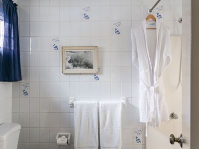 A quaint downstairs bathroom across from bedroom 3