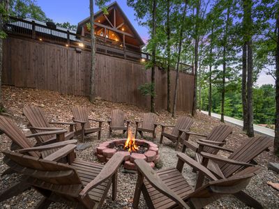 The firepit with Adirondack chairs.