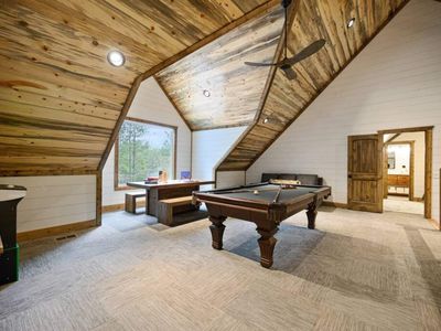 The loft has a pool table and games!