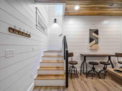 The lower level of the house hold the bunk/game room.