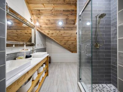 Private bunk bathroom with walk-in shower.