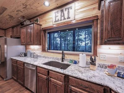 The kitchen features updated amenities and lots of counter space.