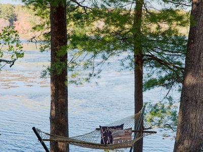 Swing under the trees as you listen to the waves lapping the shore.