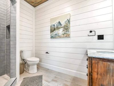 The private King bath with a walk-in shower.