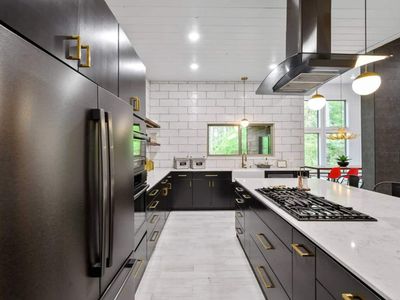A large fridge and freezer combo as well as updated appliances.