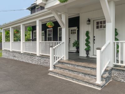 The sprawling front porch makes for a warm and inviting entrance to the home.