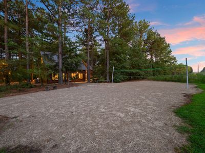 Volleyball court in the back of the property!