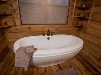 A soaking tub is also in the Master Bath!