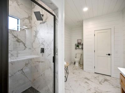 Private bathroom with a walk-in shower.