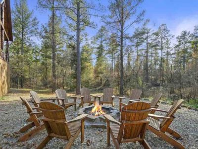 Day or night, the firepit is a prime spot to gather.