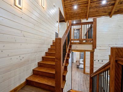 Another half staircase takes you to the second level of the cabin.