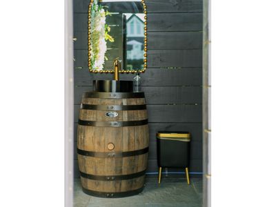 This lovely powder room is available on the pool deck for easy access between dips!