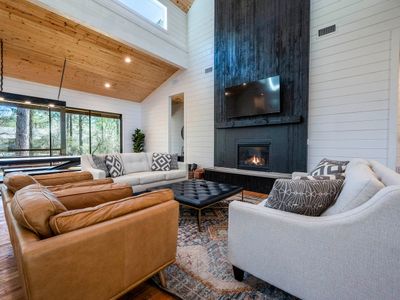 The floor to ceiling gas fireplace.