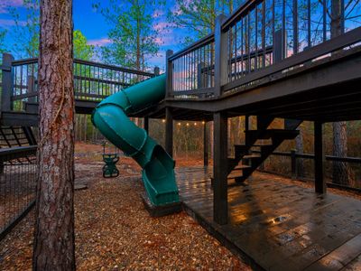 The fun playscape includes 2 slides!