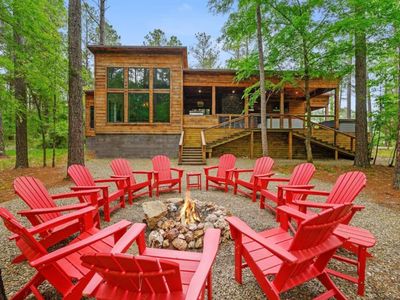 Enjoy the firepit at this modern luxury cabin.