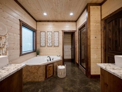 Master Suite private bath with luxury oversized soaking tub.