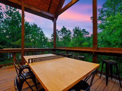 Outdoor dining table doubles as a ping pong table!