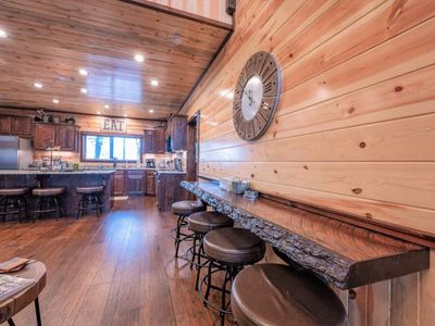 There are 4 more bar top seats in the lodge room.