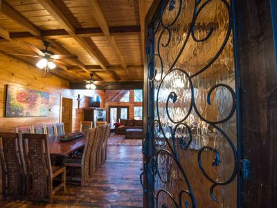 As you enter, you are greeted by an open concept living room and dining area.