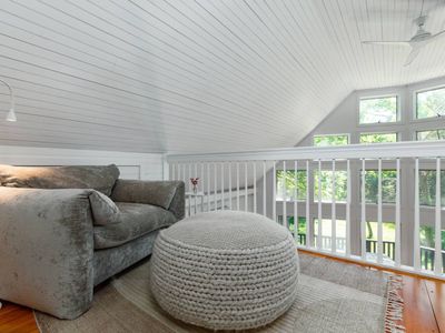 The sitting area for the master bedroom at the top of the stairs
