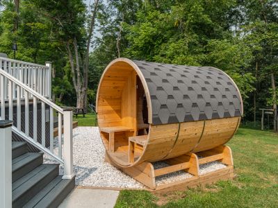 This backyard barrel sauna is a perfect place to unwind.