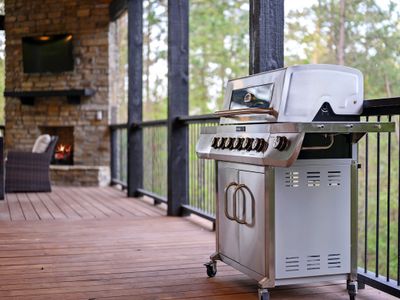 Gas grill, propane provided, on the deck!