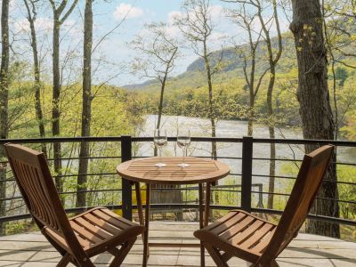 Enjoy lake views from your own private balcony off the primary bedroom.